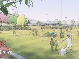 An artist impression of the proposed rugby ground with drawings of spectators and people playing rugby. There are trees in the background and two clubhouse buildings