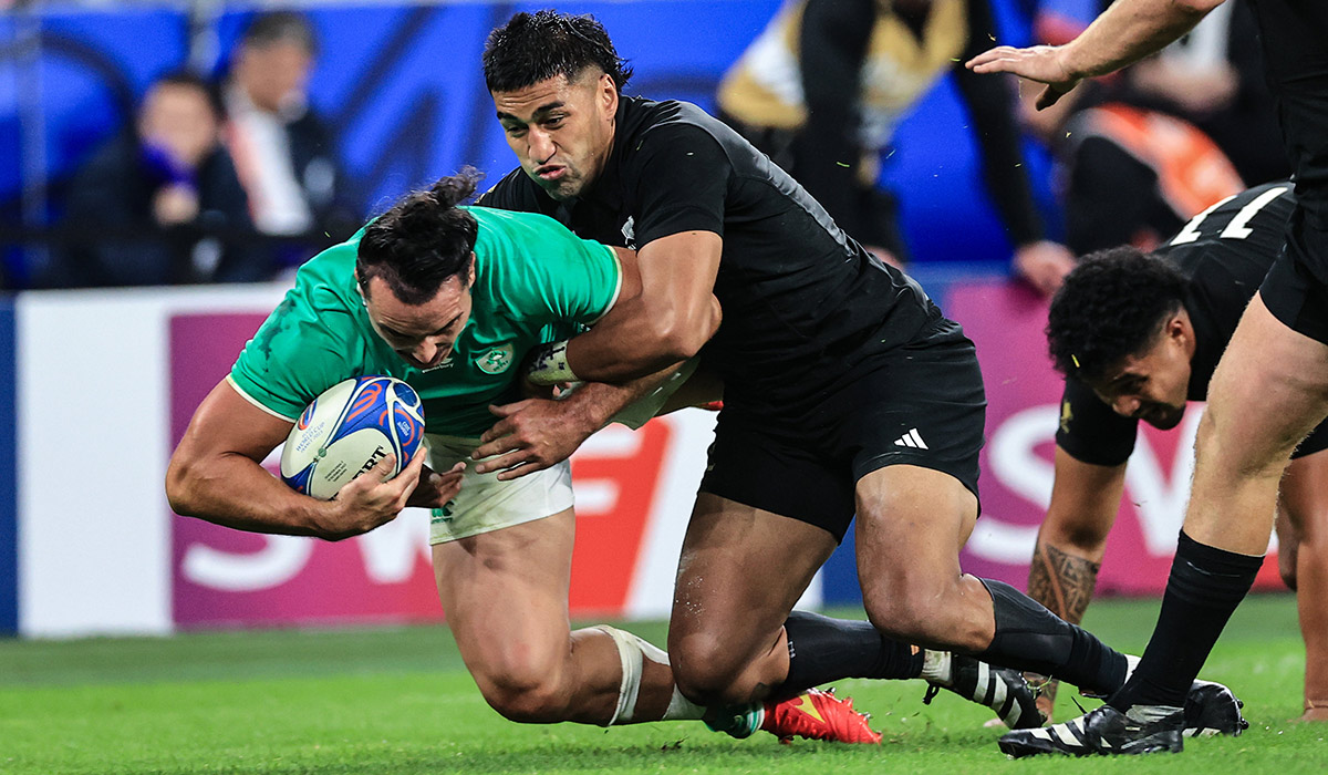 Rugby World Cup France 2023 Quarter Final Stade de France St Denis Paris 14/10/2023 Ireland vs New Zealand All Blacks Ireland’s James Lowe is tackled by All Blacks Rieko Ioane. Pic: INPHO/Billy Stickland