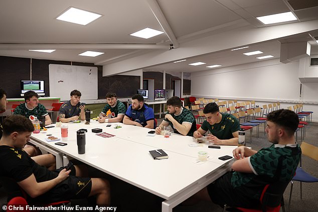 The players relax in the mess hall with chicken tikka wraps popular with Whiffin’s squad but there are no set meals as the number of calories consumed is different for each individual