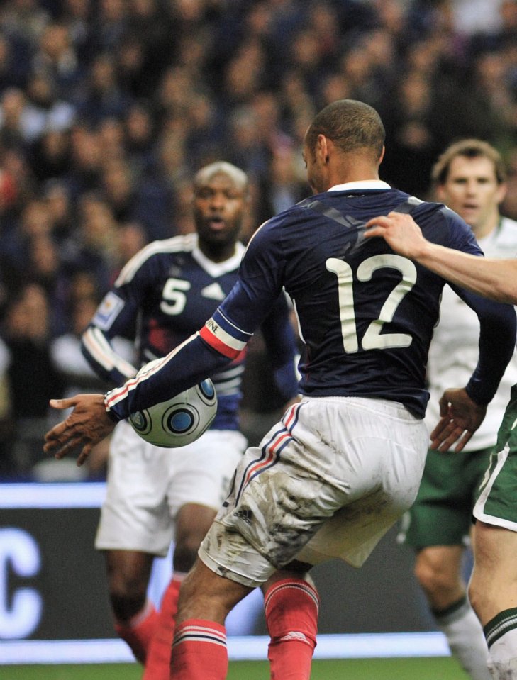 French soccer player, number 12, controls the ball during a match.