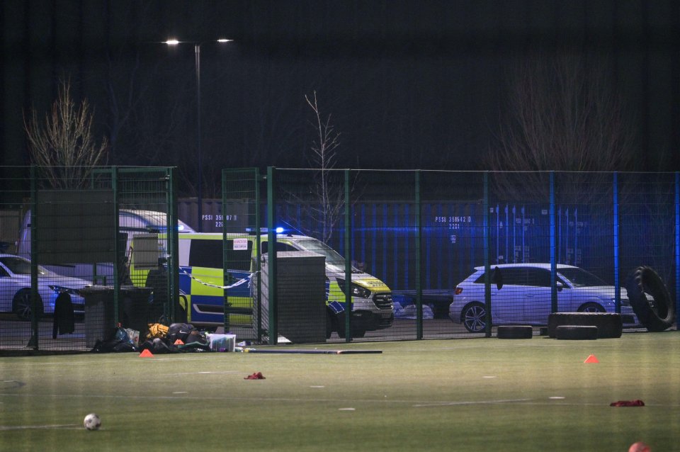 Police investigating a car crash at a football pitch where a child died.