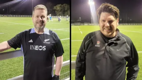 'MANvFAT rugby club has changed my life completely' BBC Two side-by-side images of rugby players in training kit. Paul Parfitt is on the left and is wearing a New Zealand All Blacks shirt and gloves. Andy Holliday is wearing an England Rugby training top. Both are standing in front of the rugby pitch.